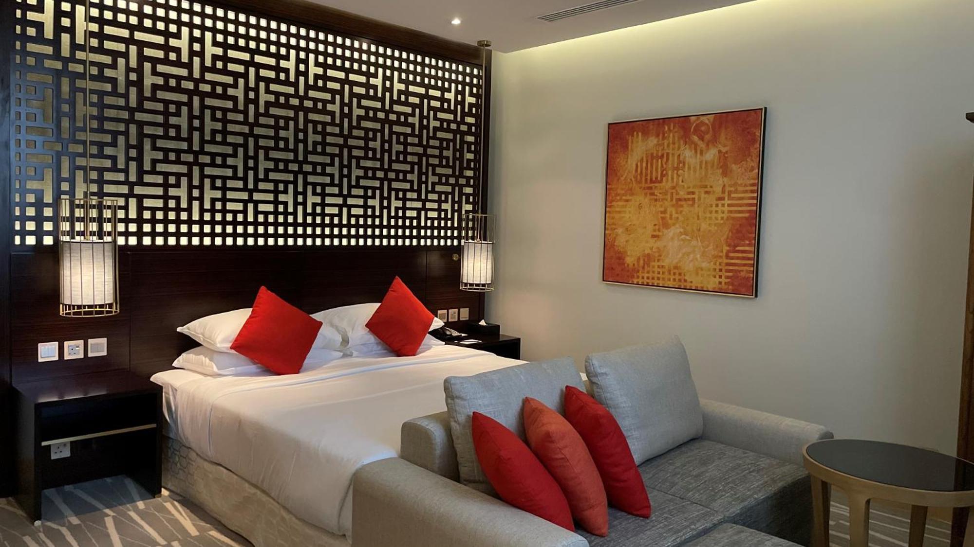 Ramada Hotel & Suites By Wyndham Al Qassim Al Bukayriah Exterior foto A bedroom at the hotel